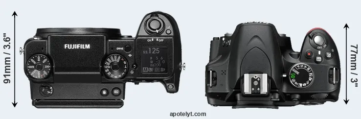 Compare GFX 50S versus D3200 top