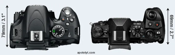 Compare D5100 versus E-M1 III top
